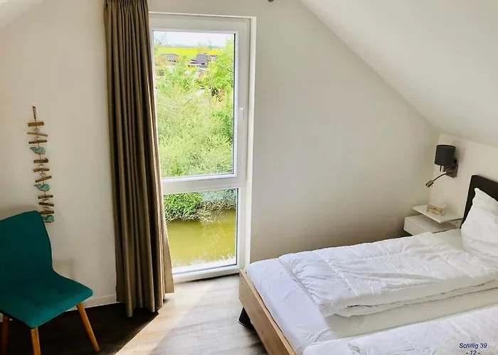 Appartamento Familienhaus An Der Nordsee - Sauna - Kamin - Suedterrasse Direkt Ueber Dem Wasser